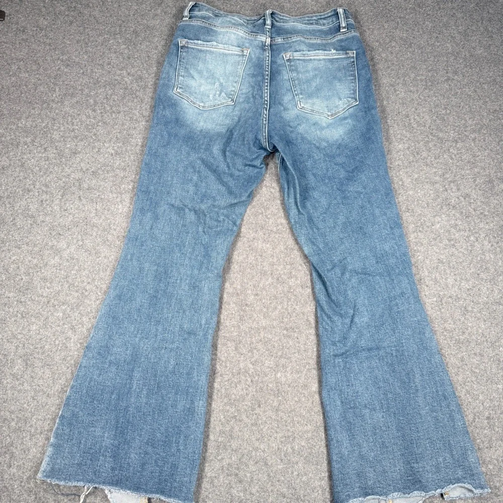 Washed Light Blue High-Rise Flare Jeans with Raw Hem